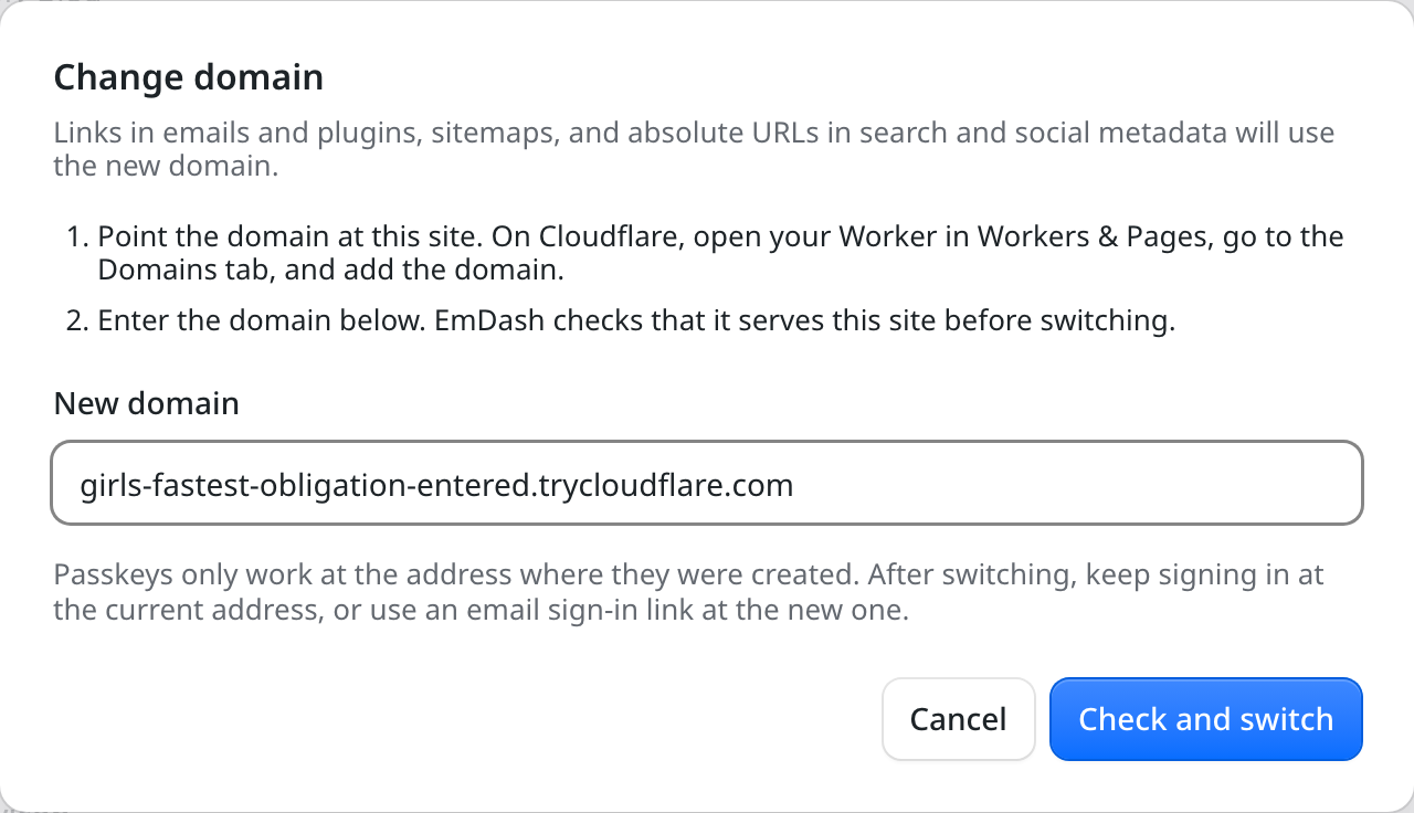 The Change domain dialog with setup steps for pointing the domain at the site, a New domain field, a note that passkeys only work at the address where they were created, and Cancel and Check and switch buttons